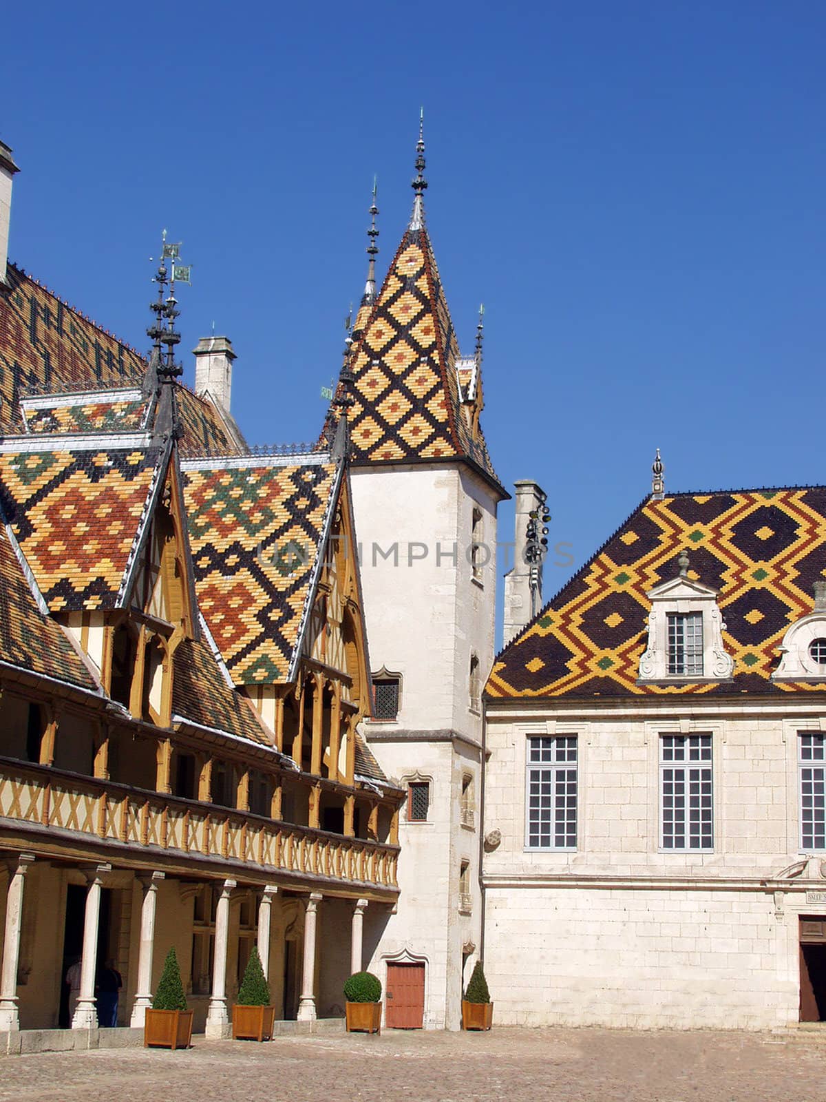The mosaic roof Hospice in Bon (Hôtel-Dieu de Beaune). France