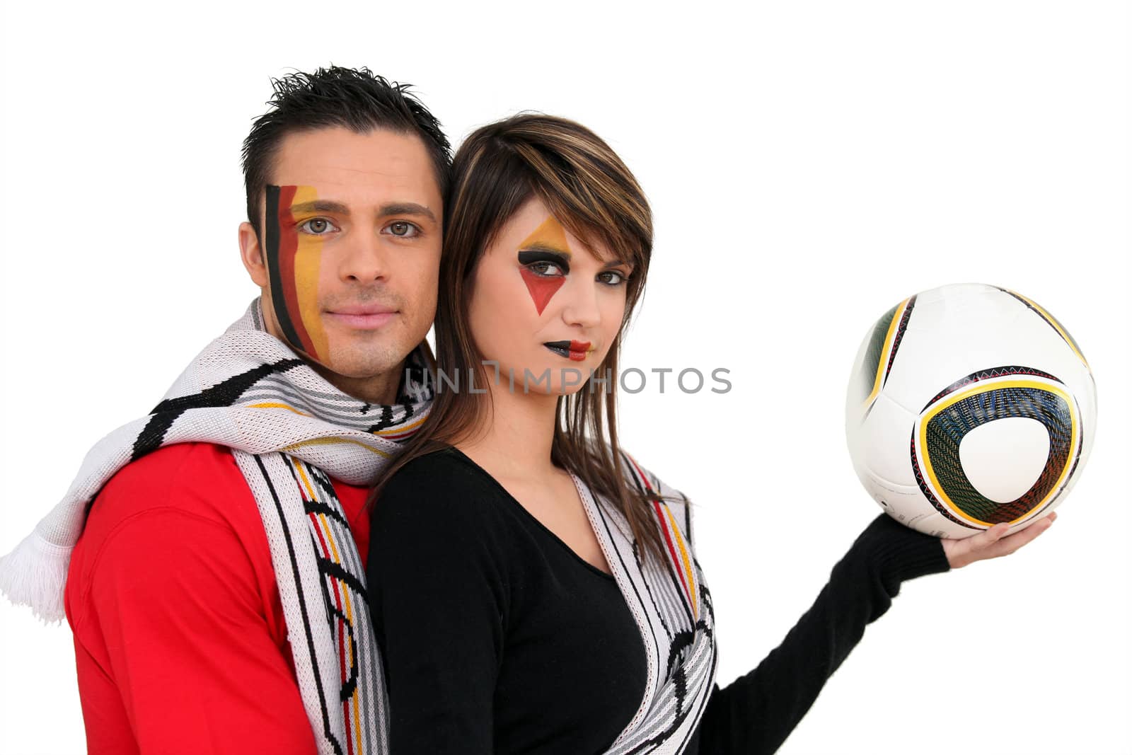 Couple supporting German football team by phovoir