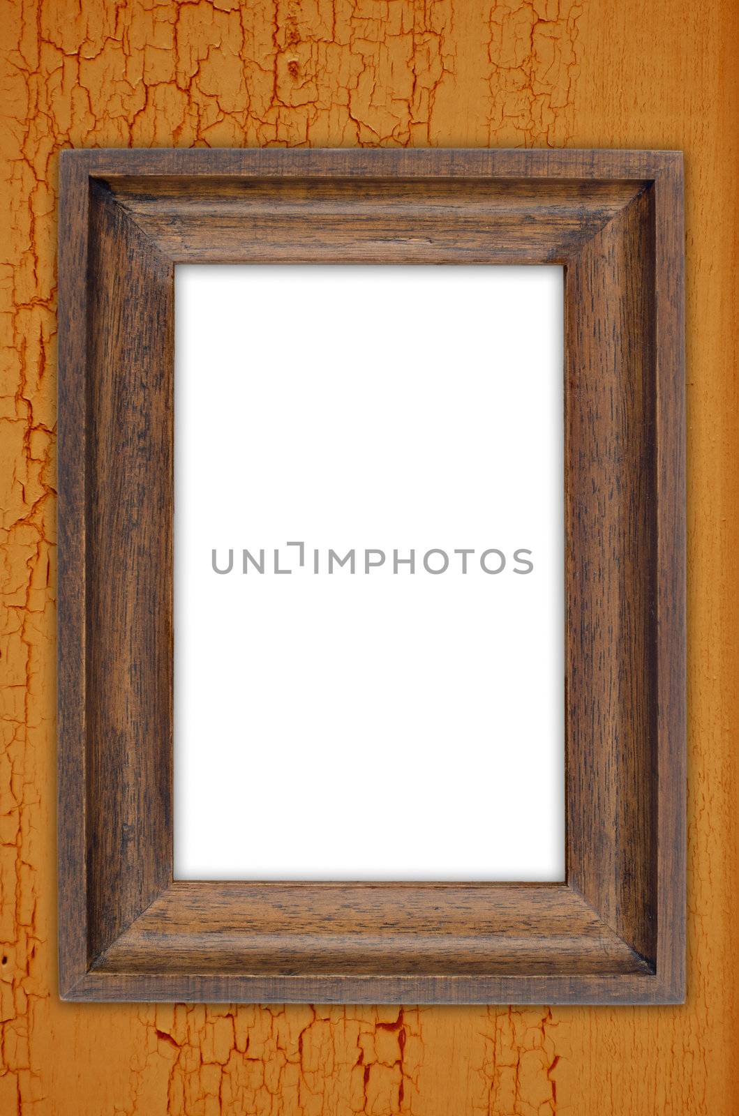 Vintage wooden frame on a wood made wall.
