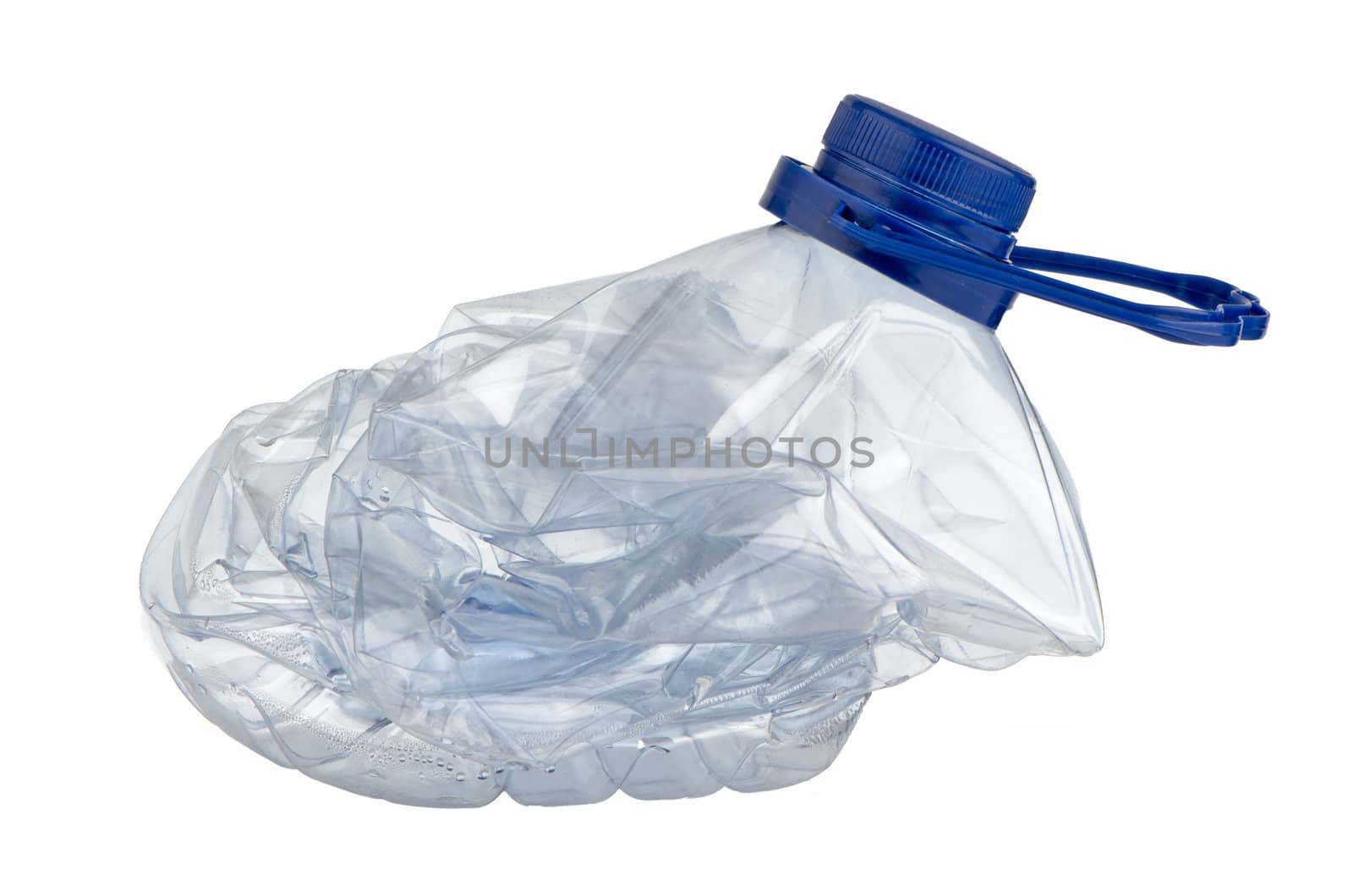 Squashed plastic bottle in order to recycle in blue color.