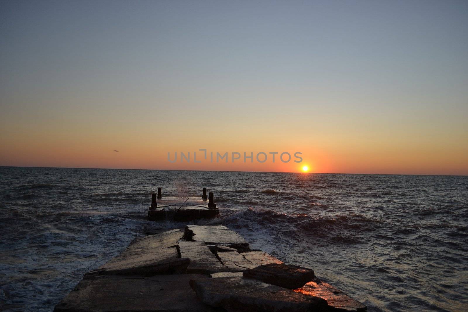 View of the dock over sunset