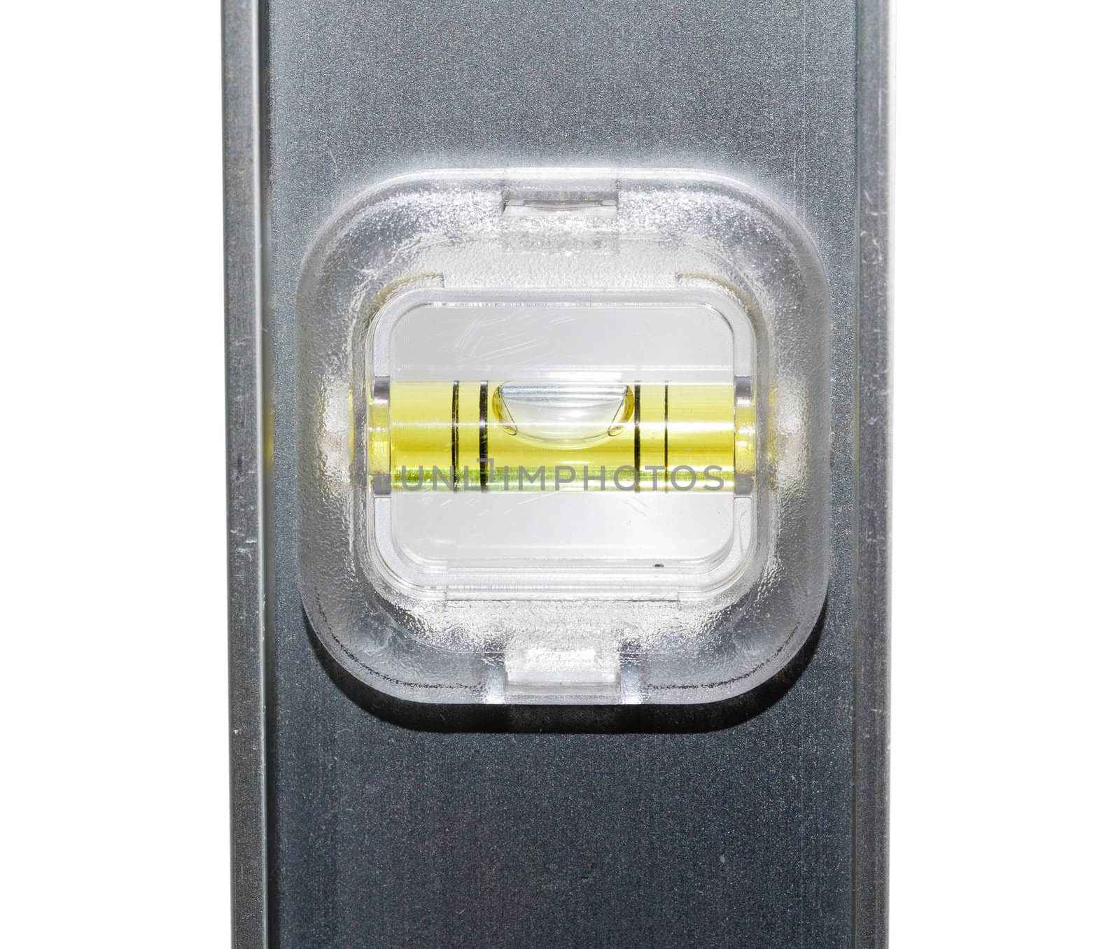 Yellow spirit level in aluminum measuring ruler in inches and cm