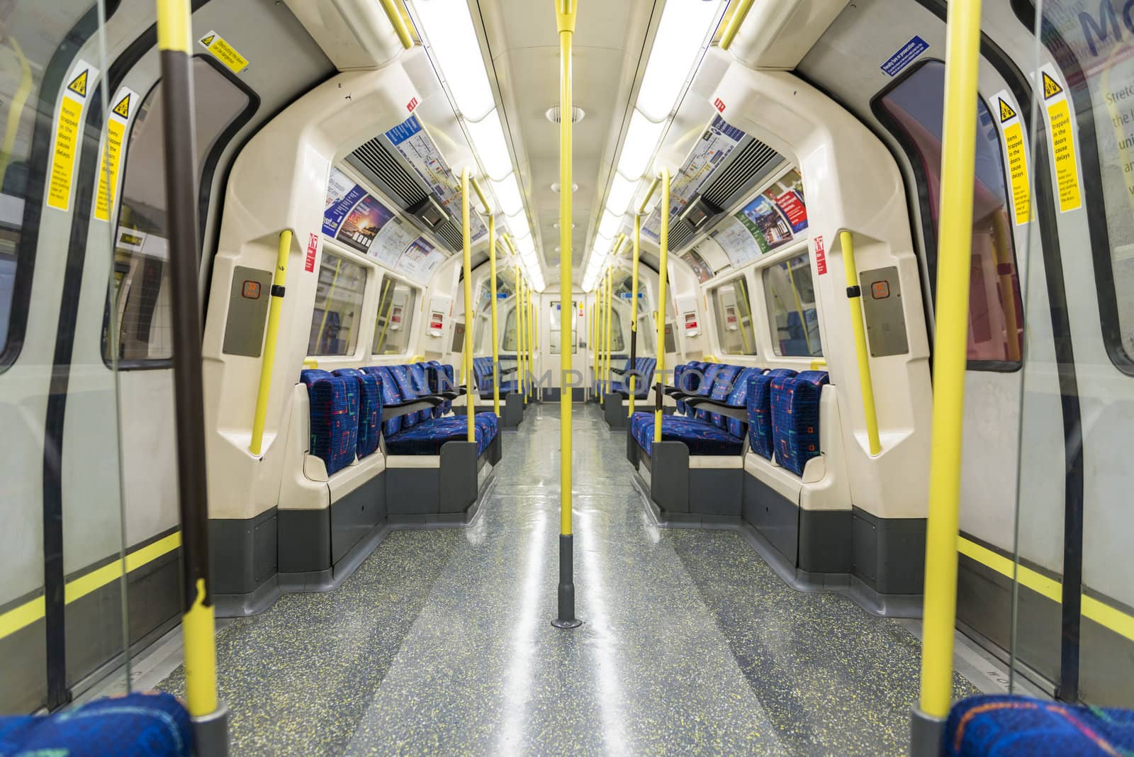 LONDON, UK - APRIL 07: Interior of empty Northern line underground train showing access doors. April 07, 2013 in London.