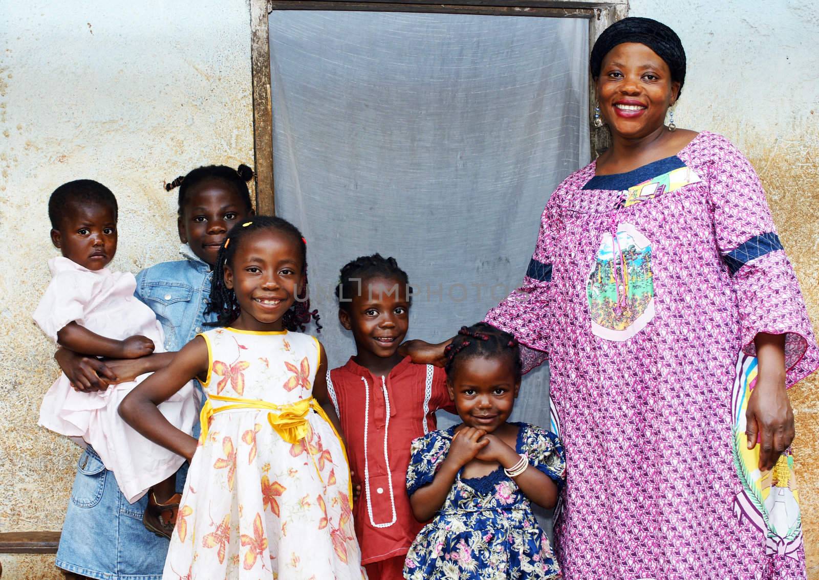 Family with pregnant African woman with five daughters