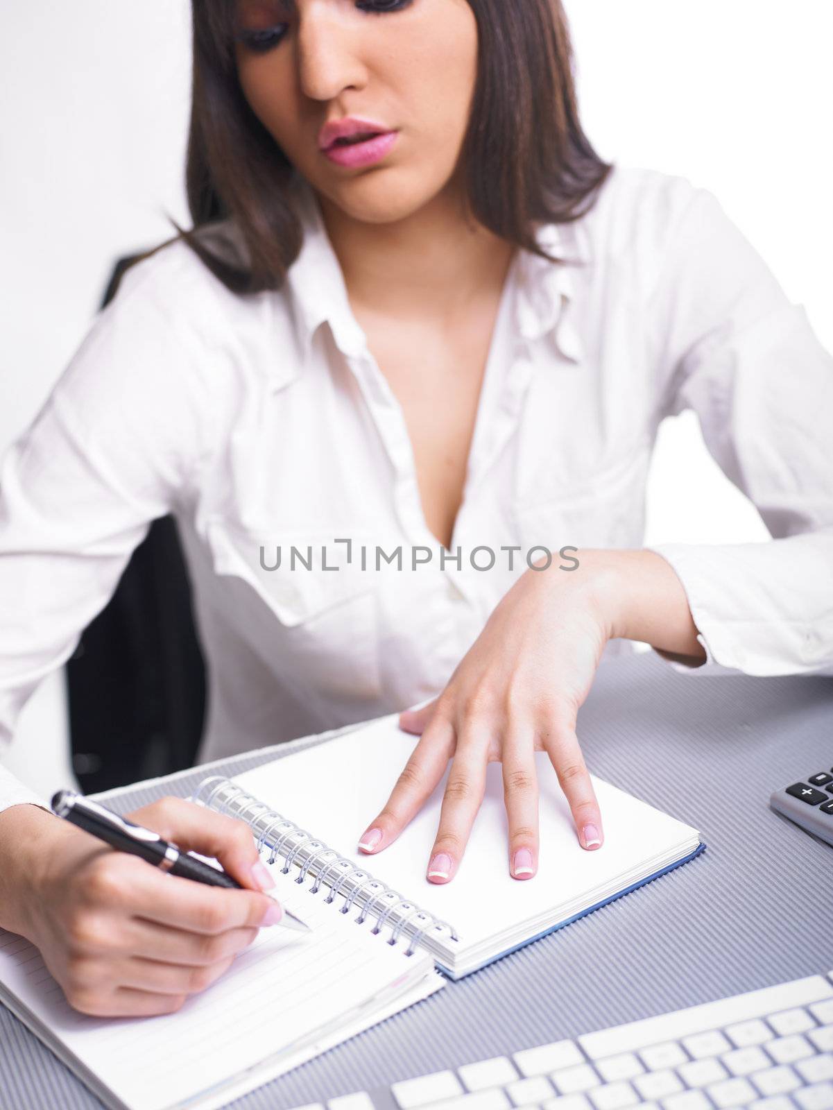 Office Assistant in white writing Schedule