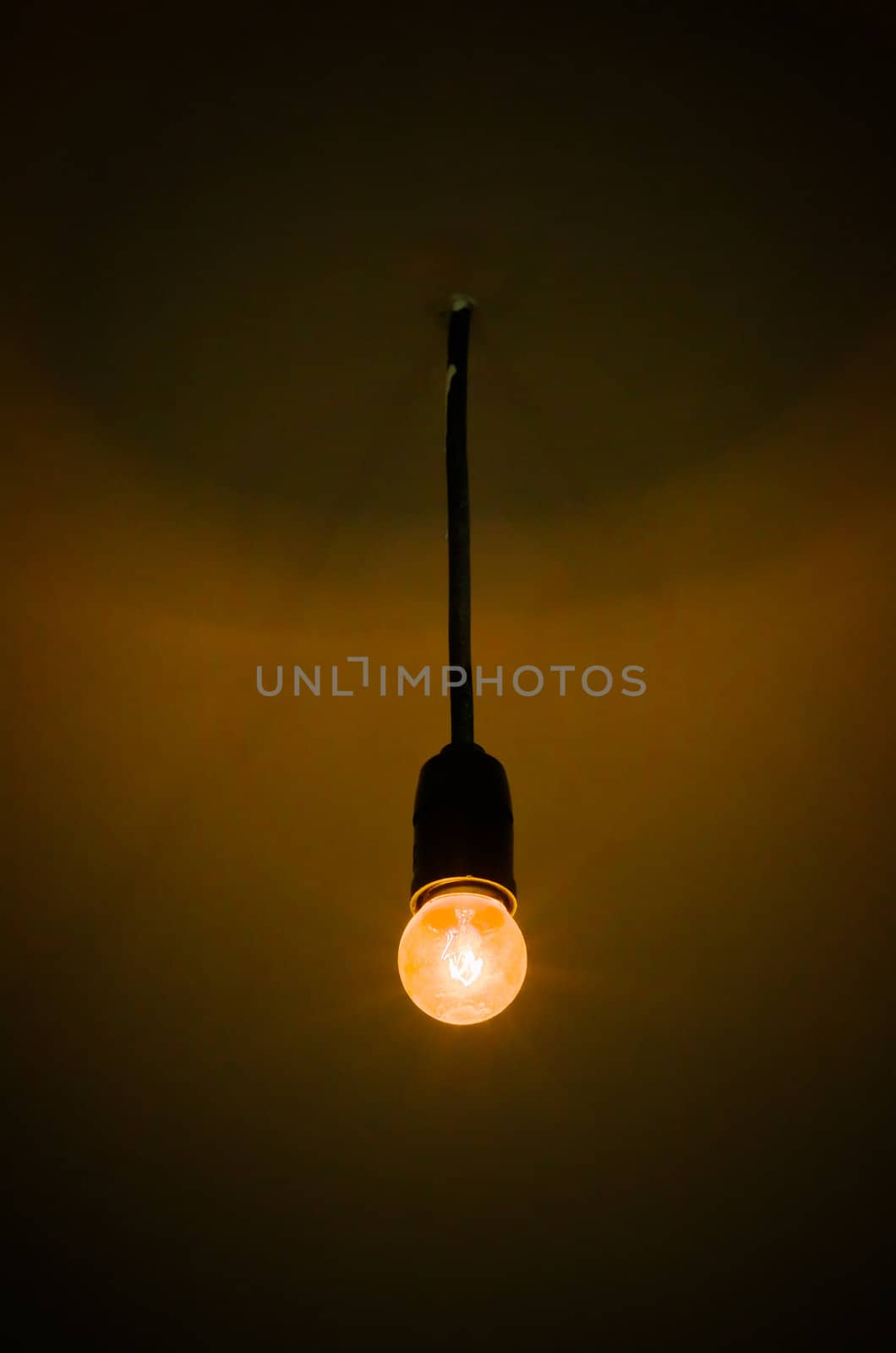 The traditional light bulb Installed on the ceiling