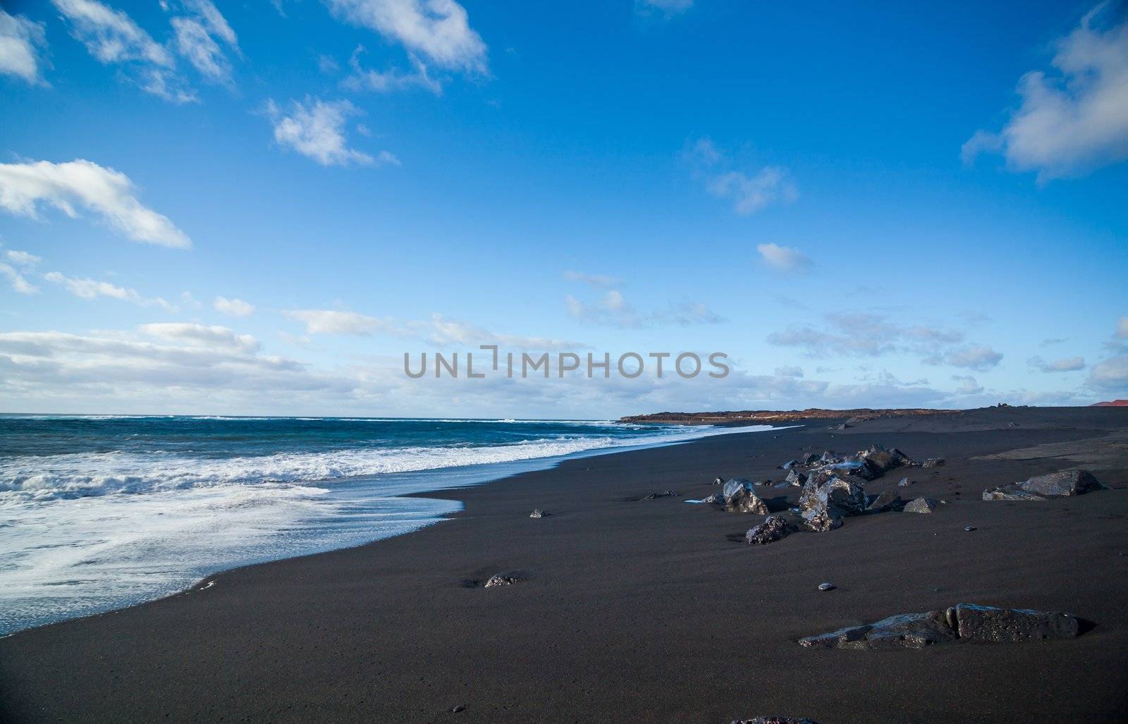 Exotic beach with black sand on Lanzarote, Canary islands, Spain