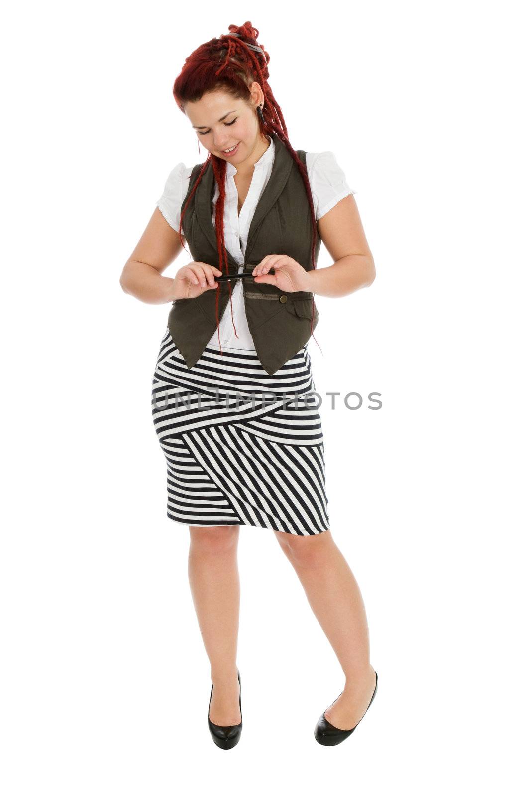 Modern beautiful girl with pen in striped skirt isolated on white background 