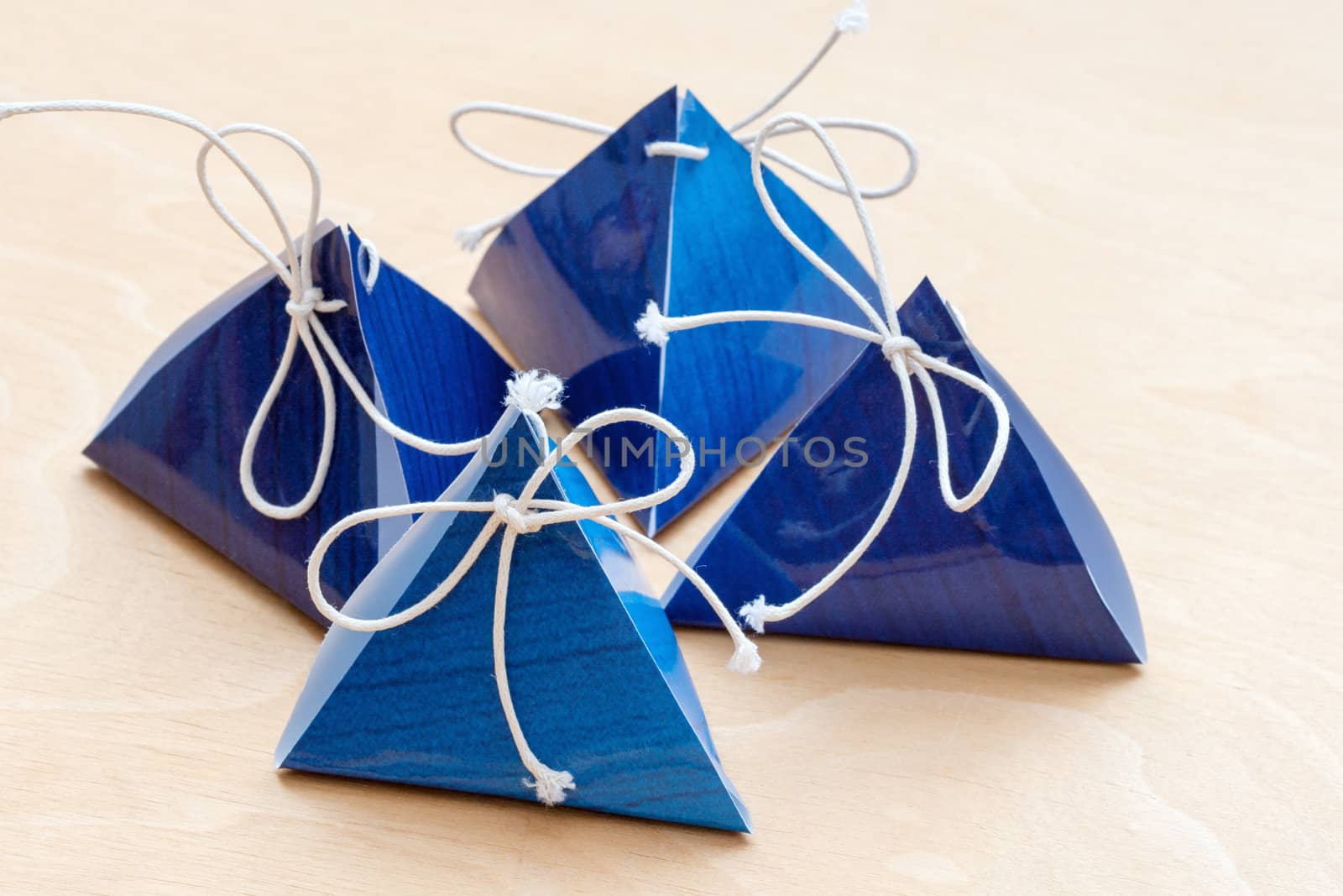 gift bags on a white wooden background