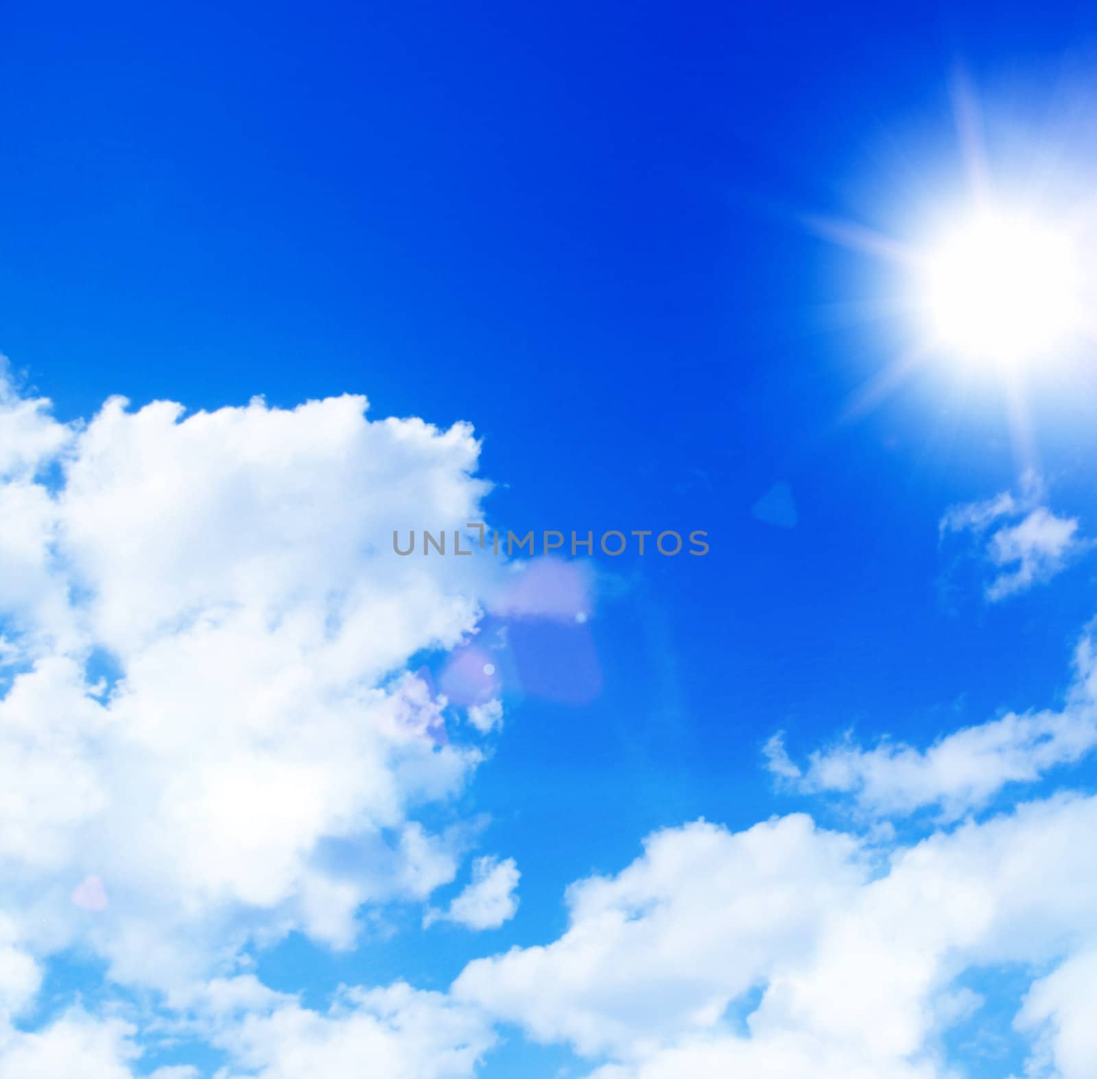 Blue sky with clouds and sun  