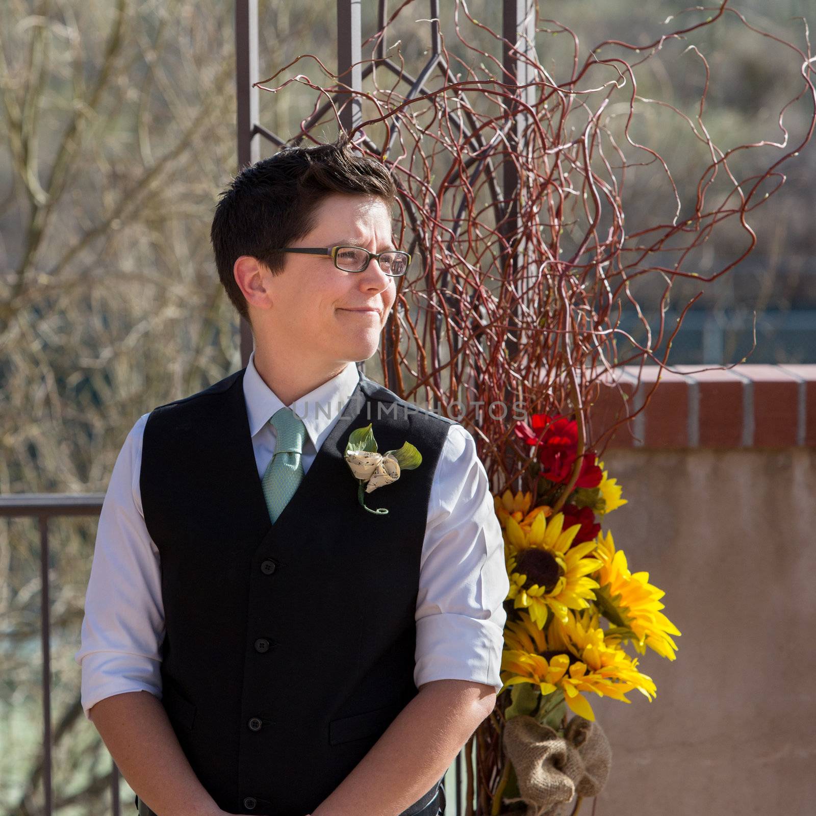 One woman in gay wedding waiting for her partner