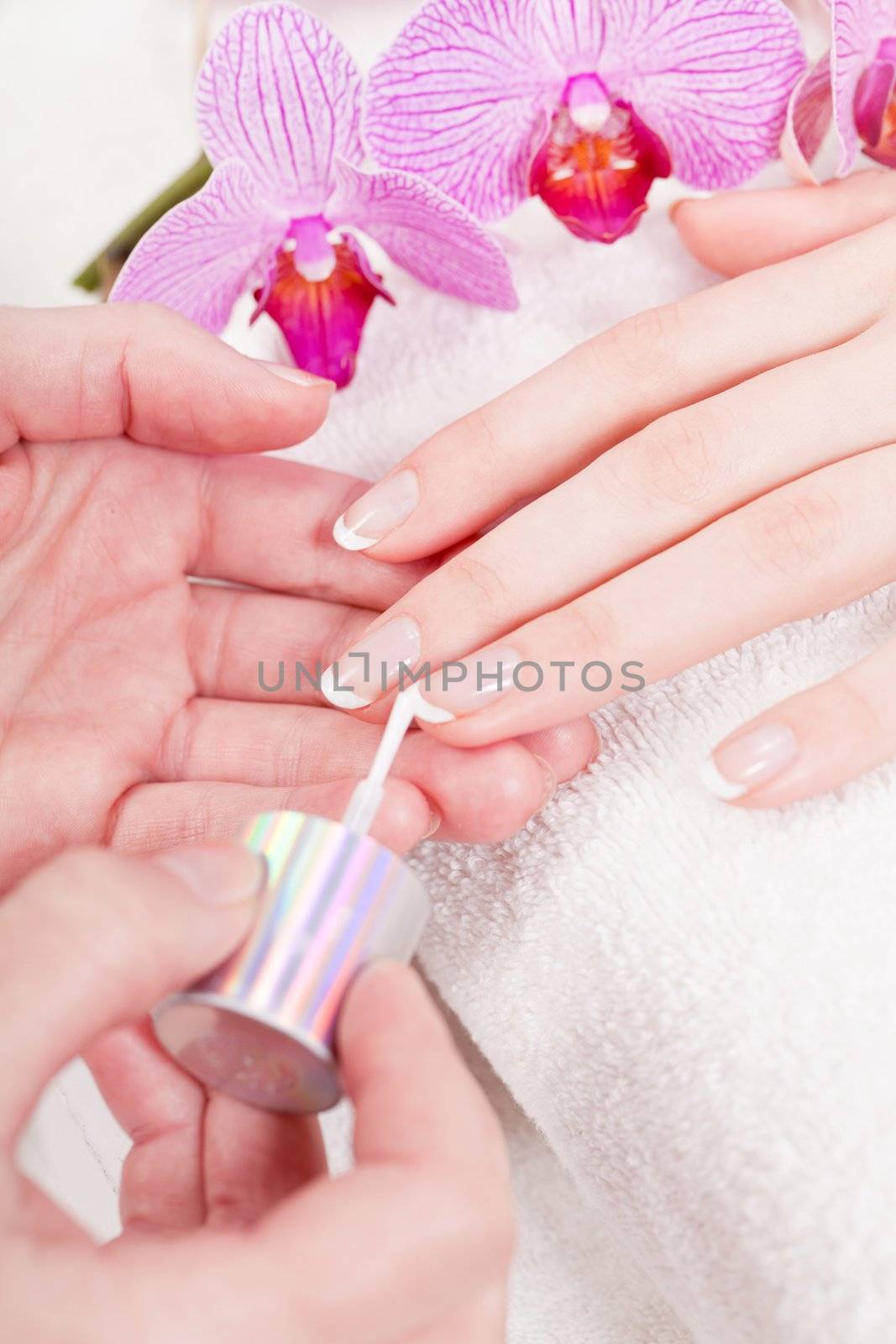 professional manicurist doing a manicure natural look 