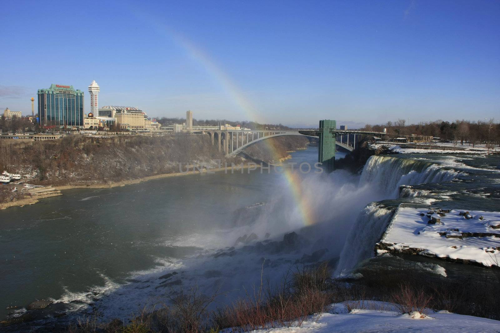 Niagara Falls and Rainbow Bridge in winter, New York, USA