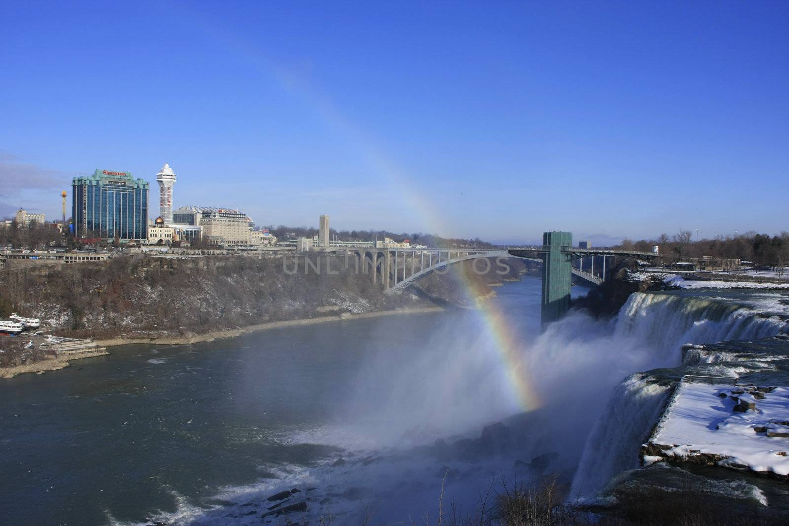 Niagara Falls and Rainbow Bridge in winter, New York, USA