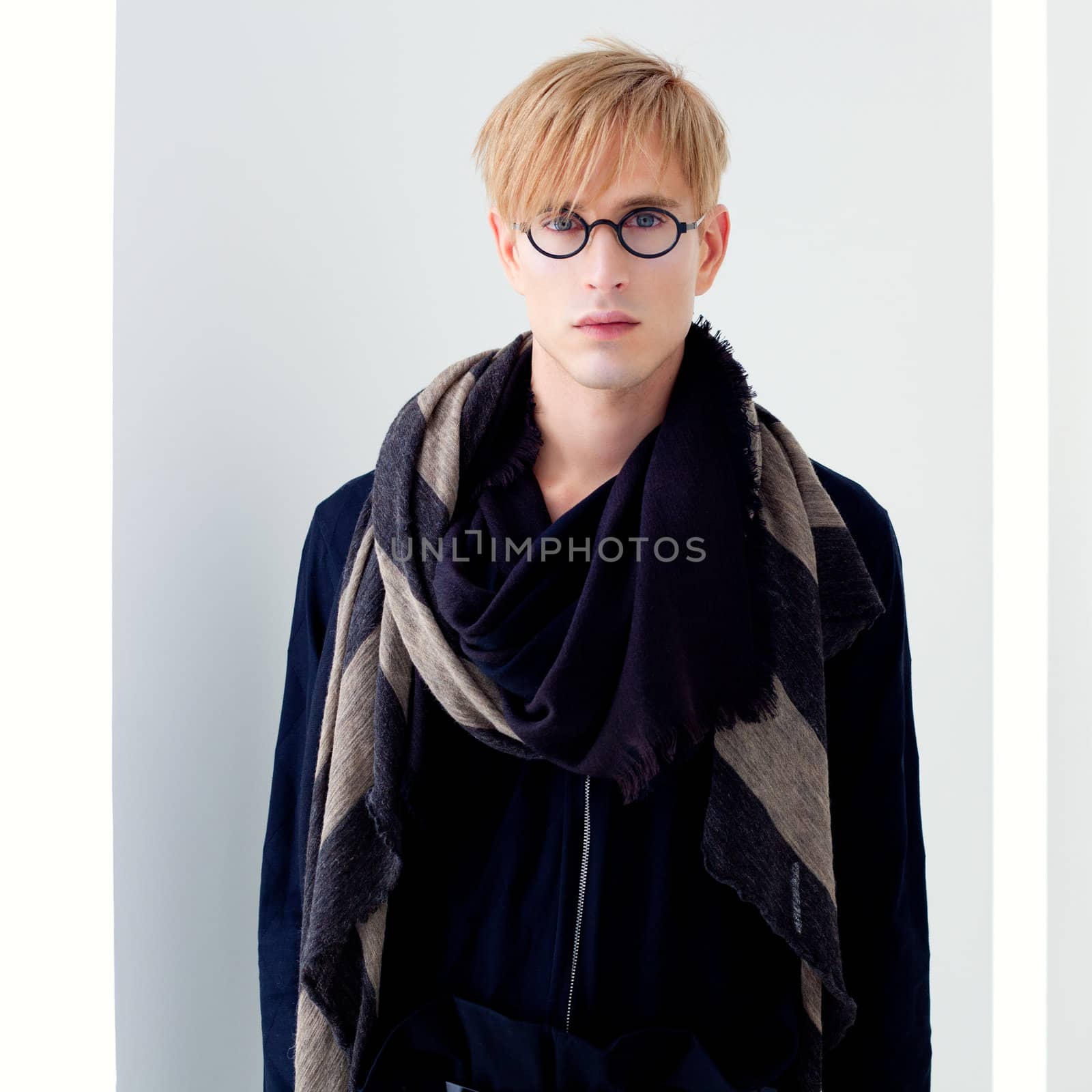 blond modern handsome student man with nerd glasses portrait