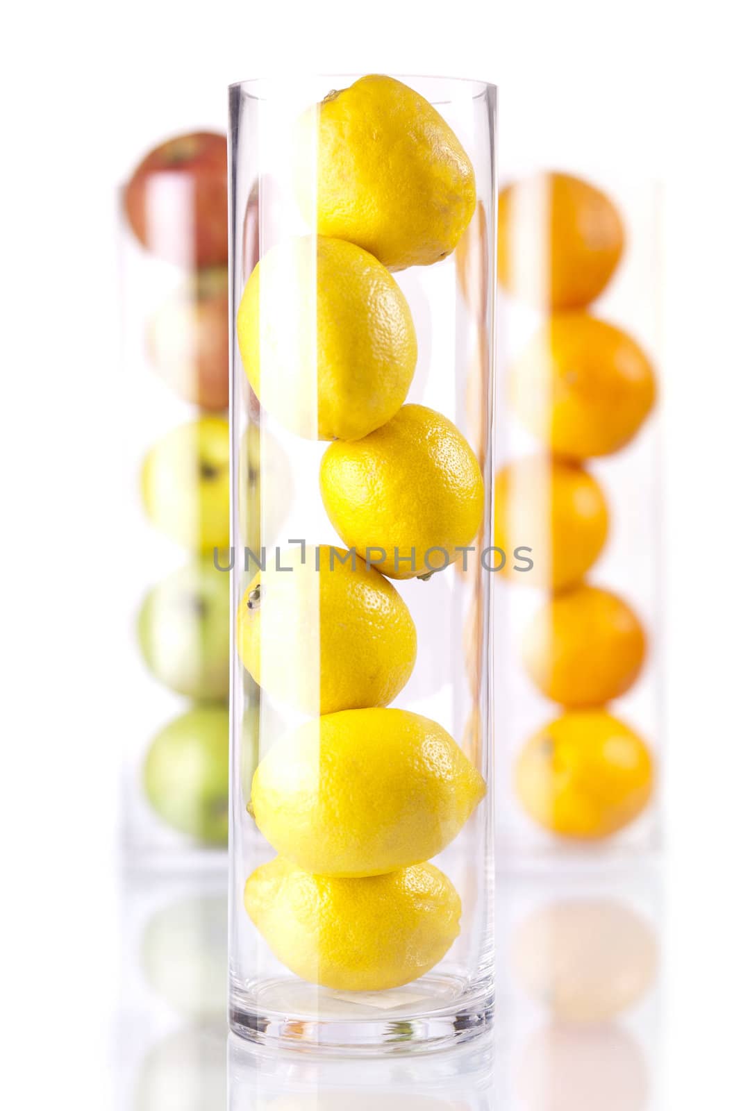 Group of fruit in glass: Oranges, Lemons, Appless