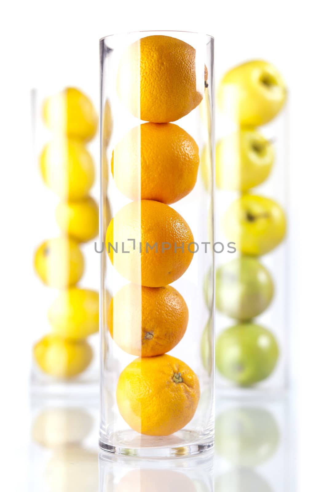 Group of fruit in glass: Oranges, Lemons, Appless