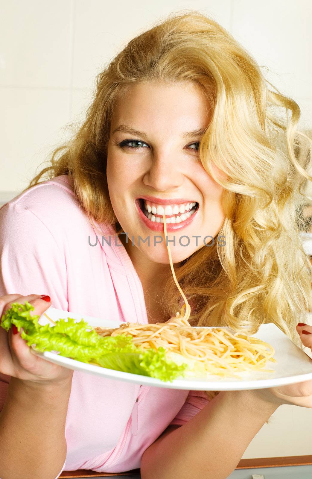 happy girl eating spaghetti by lanak