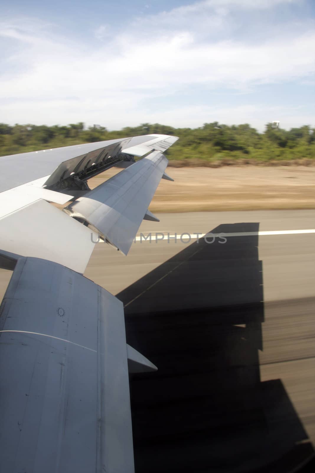 An aircraft wing at the moment of landing