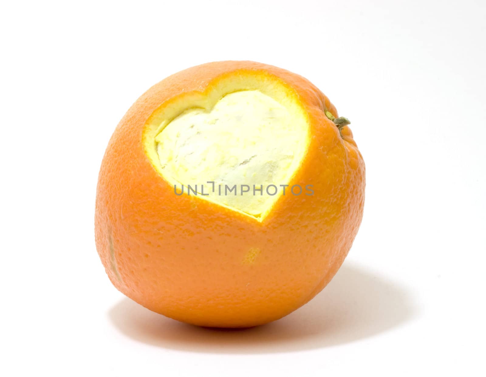 Orange with heart isolated on white