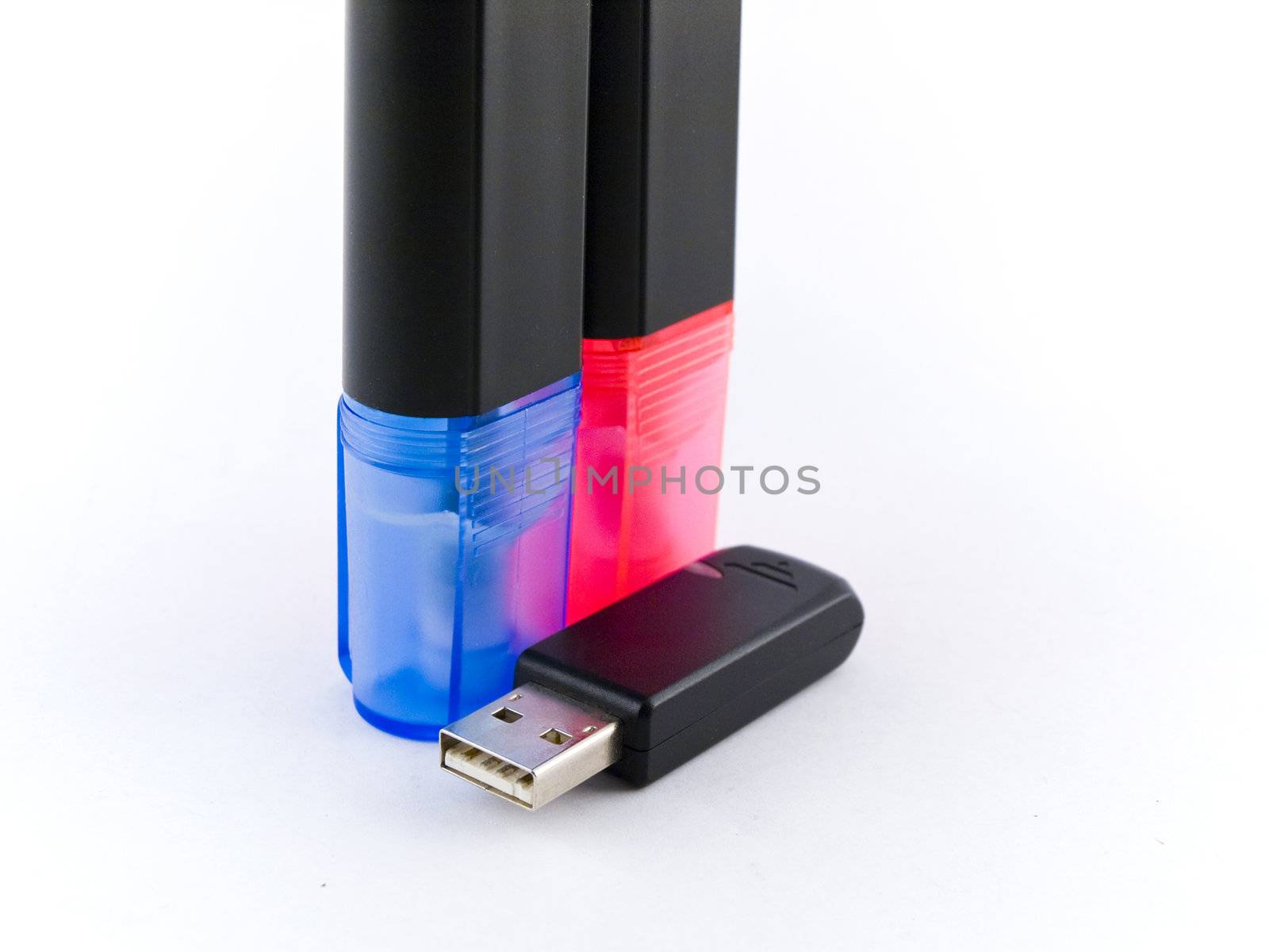 Bluetooth Dongle Memory Stick and Markers on White Background