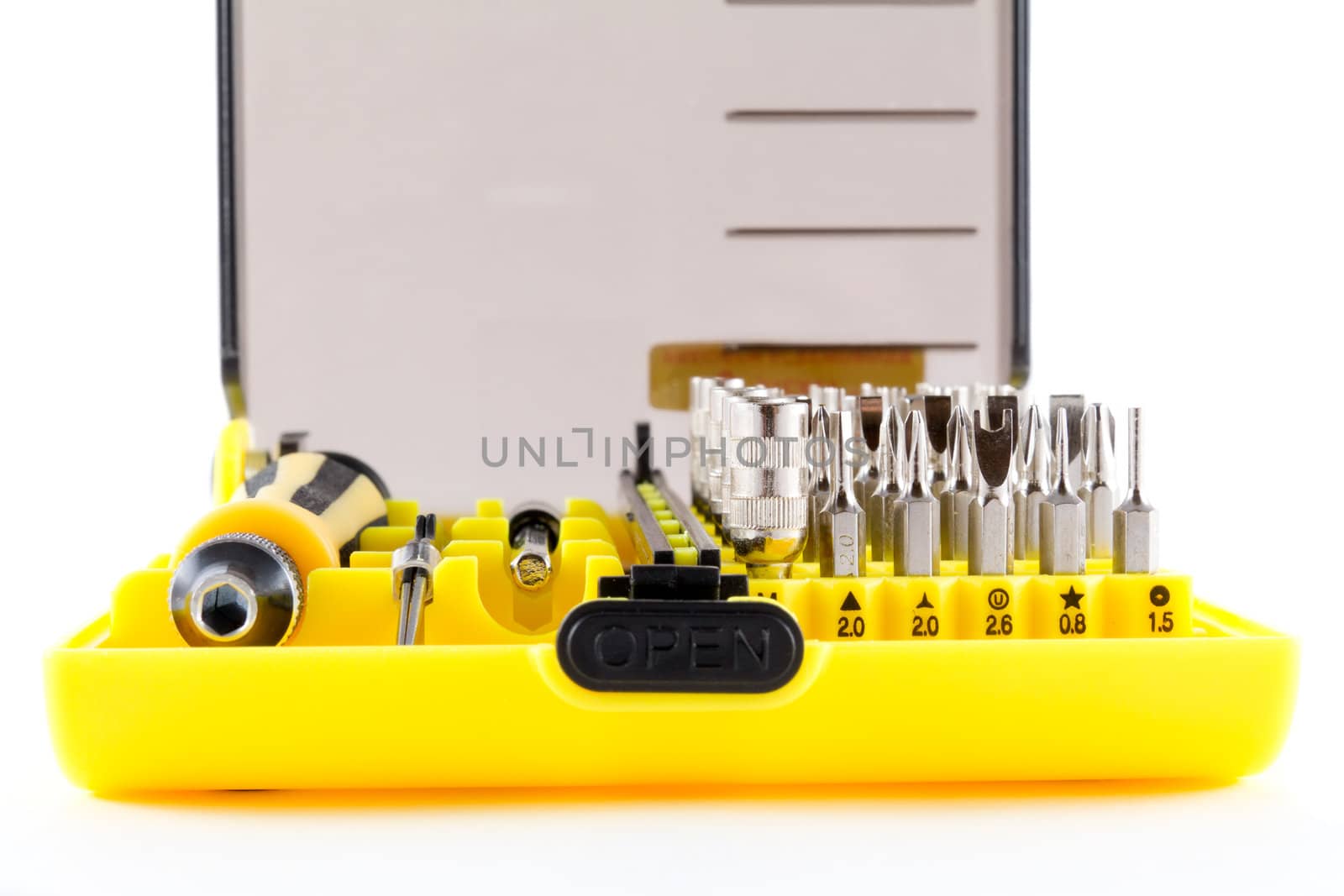 a set of screwdrivers on a light background