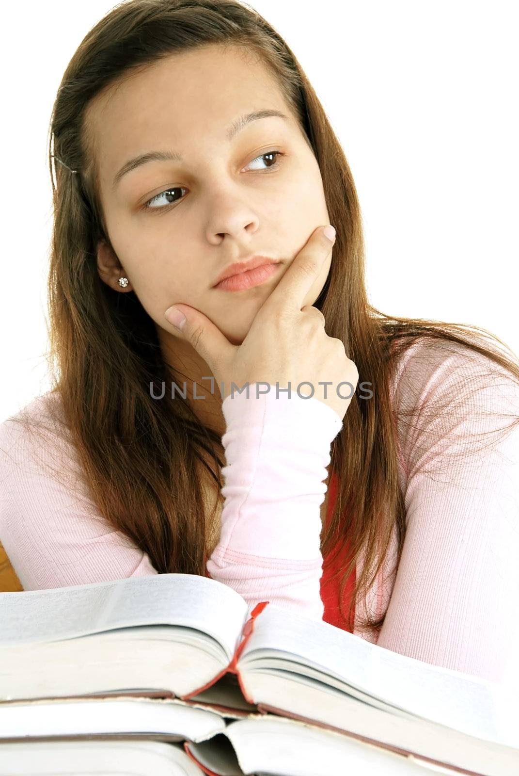 teenage girl portrait with opened books, thinking