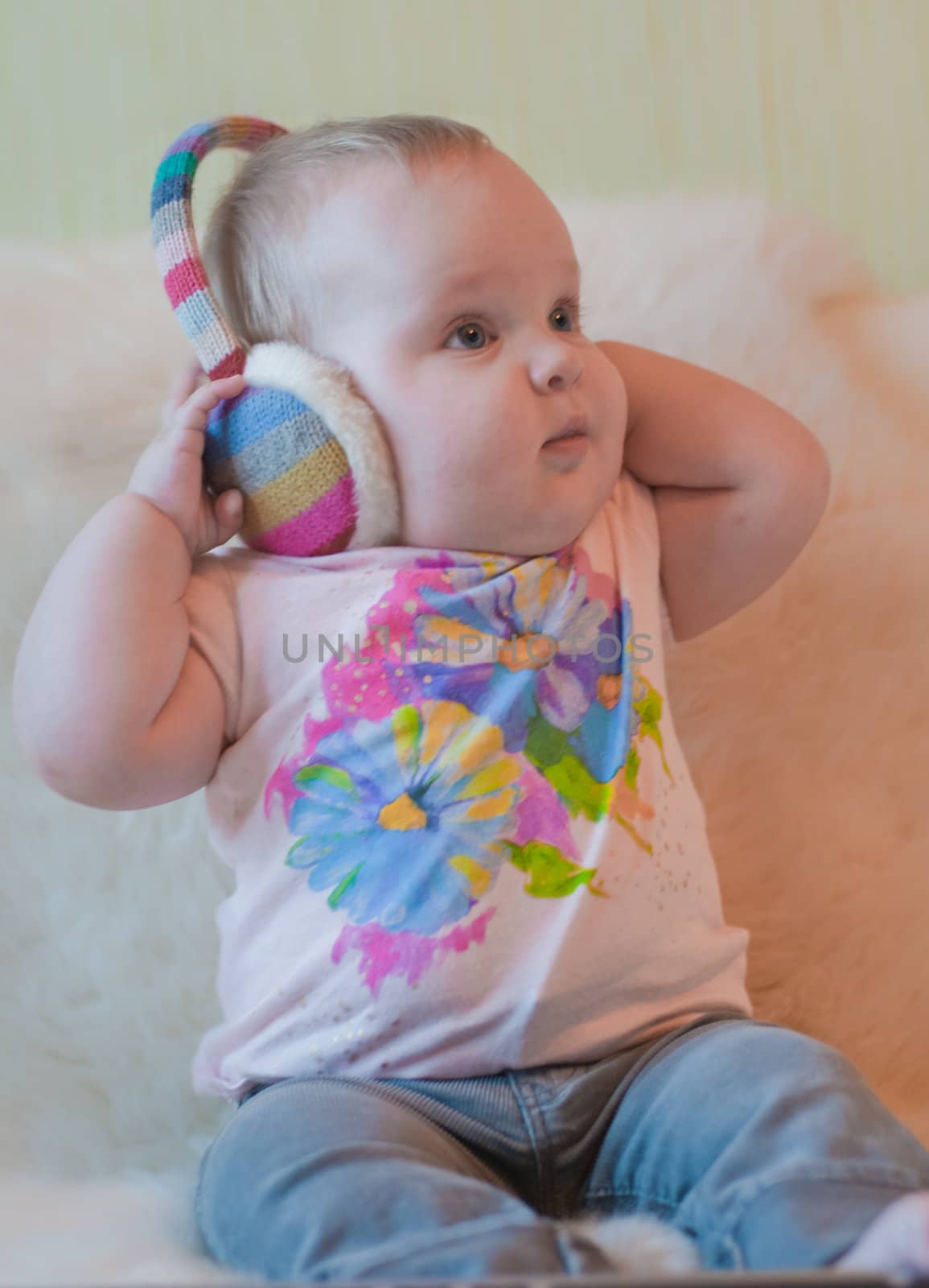 Baby with headphones by Linaga