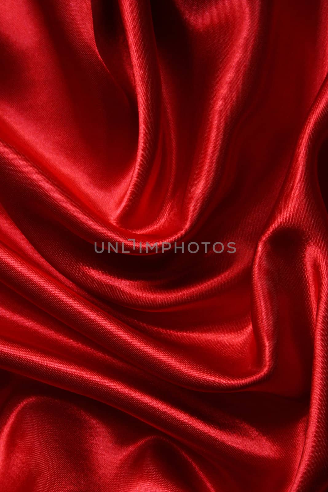 Smooth elegant red silk can use as background 