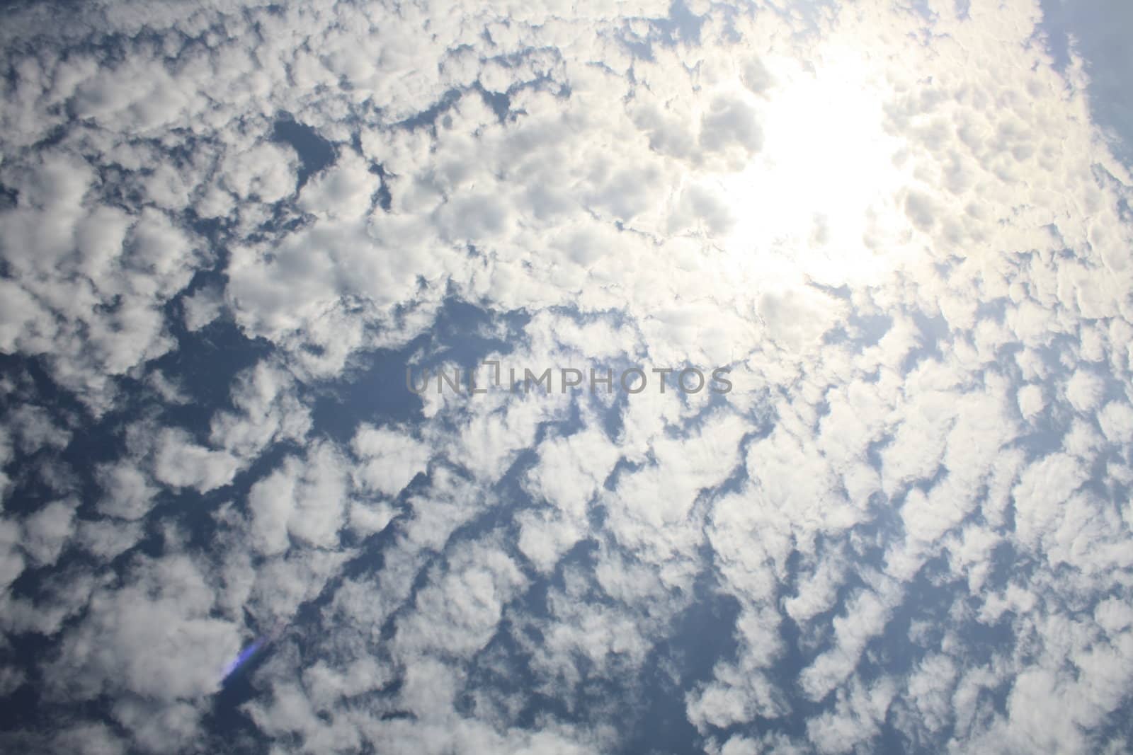 white clouds on blue sky