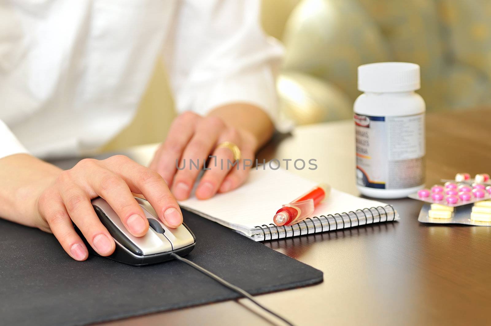 A female doctor making a a prescription
