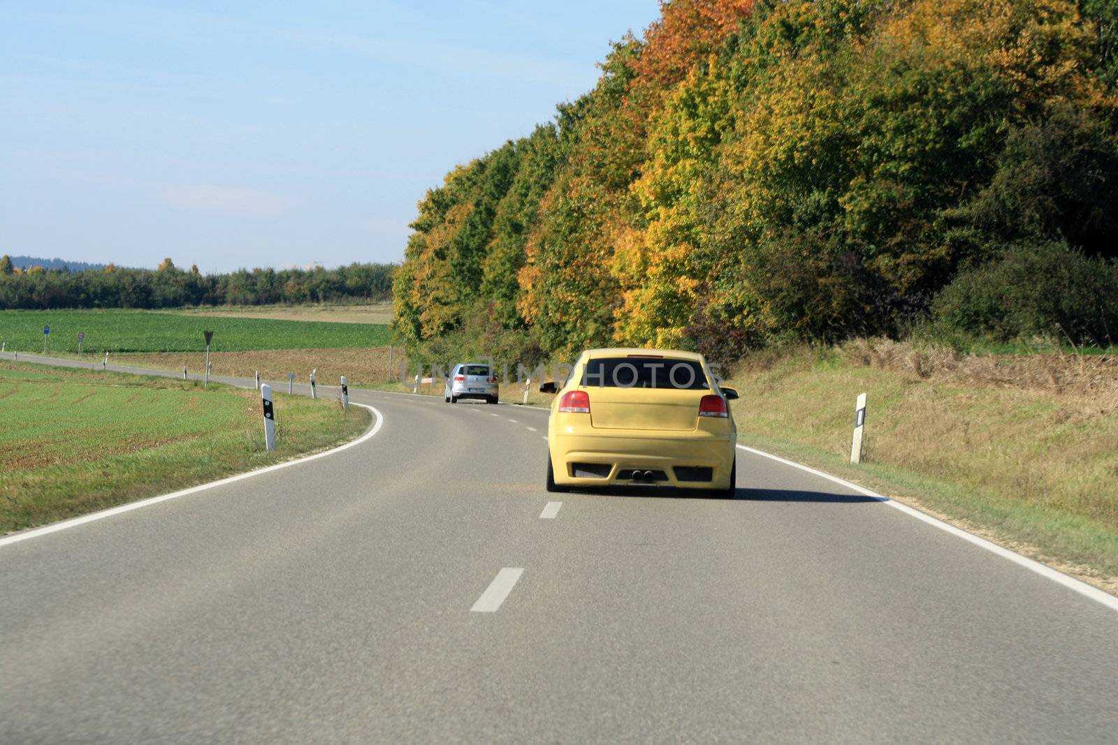 car driving on the road by photochecker