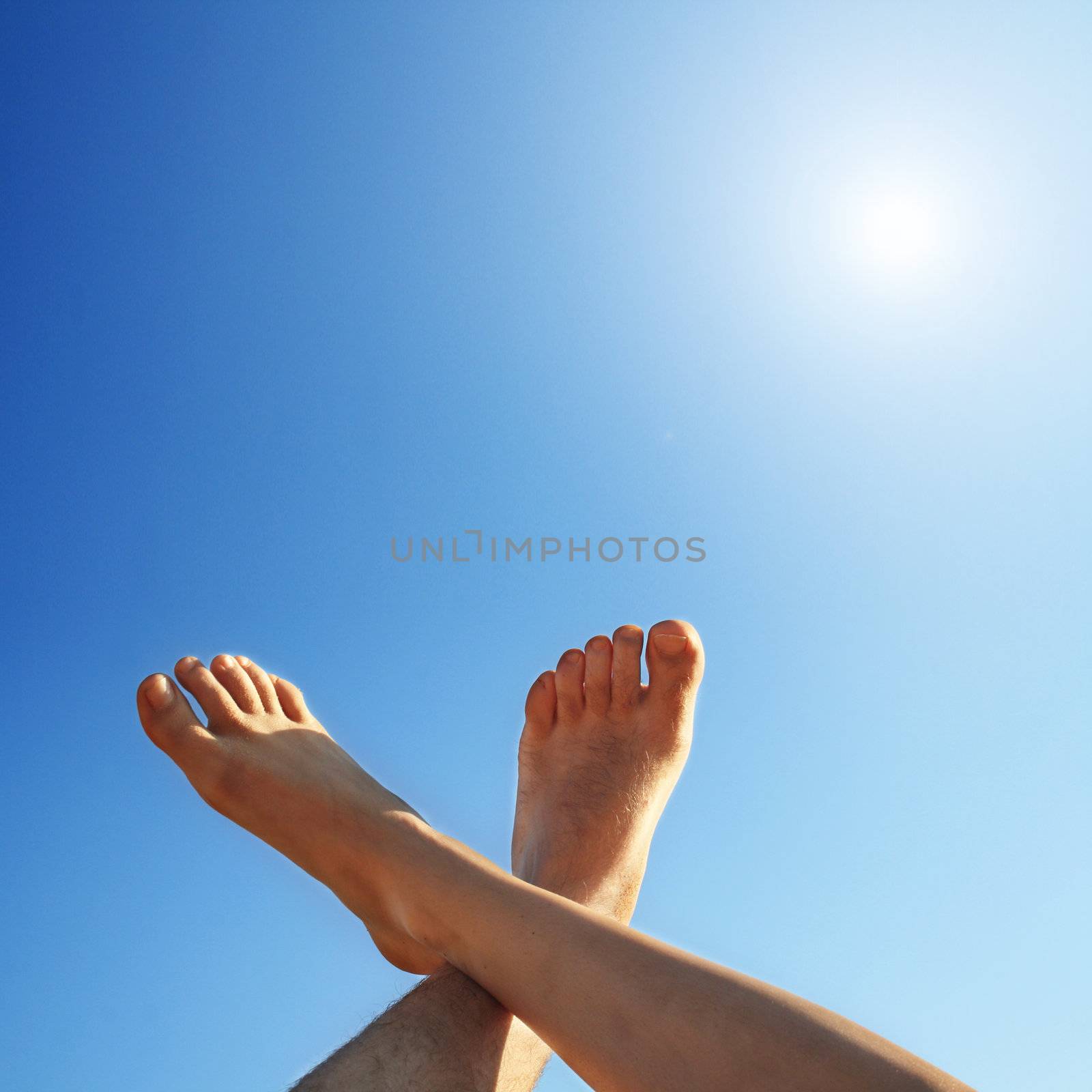 feet and sun by photochecker