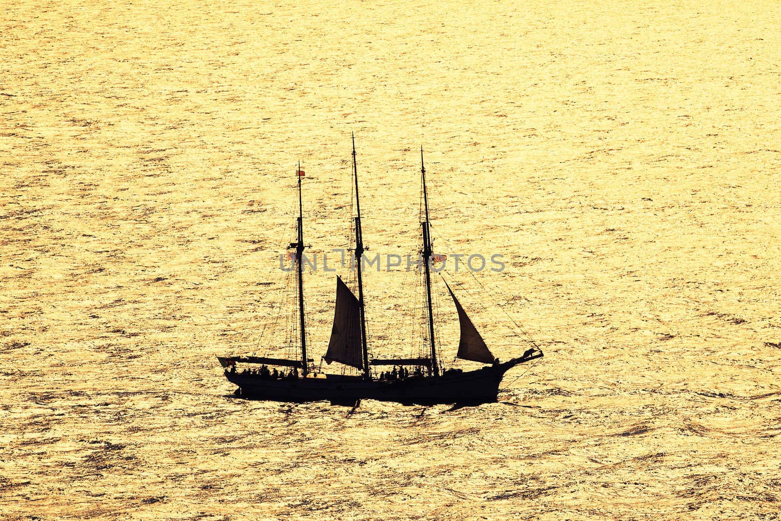 boat on the sea with sunset light