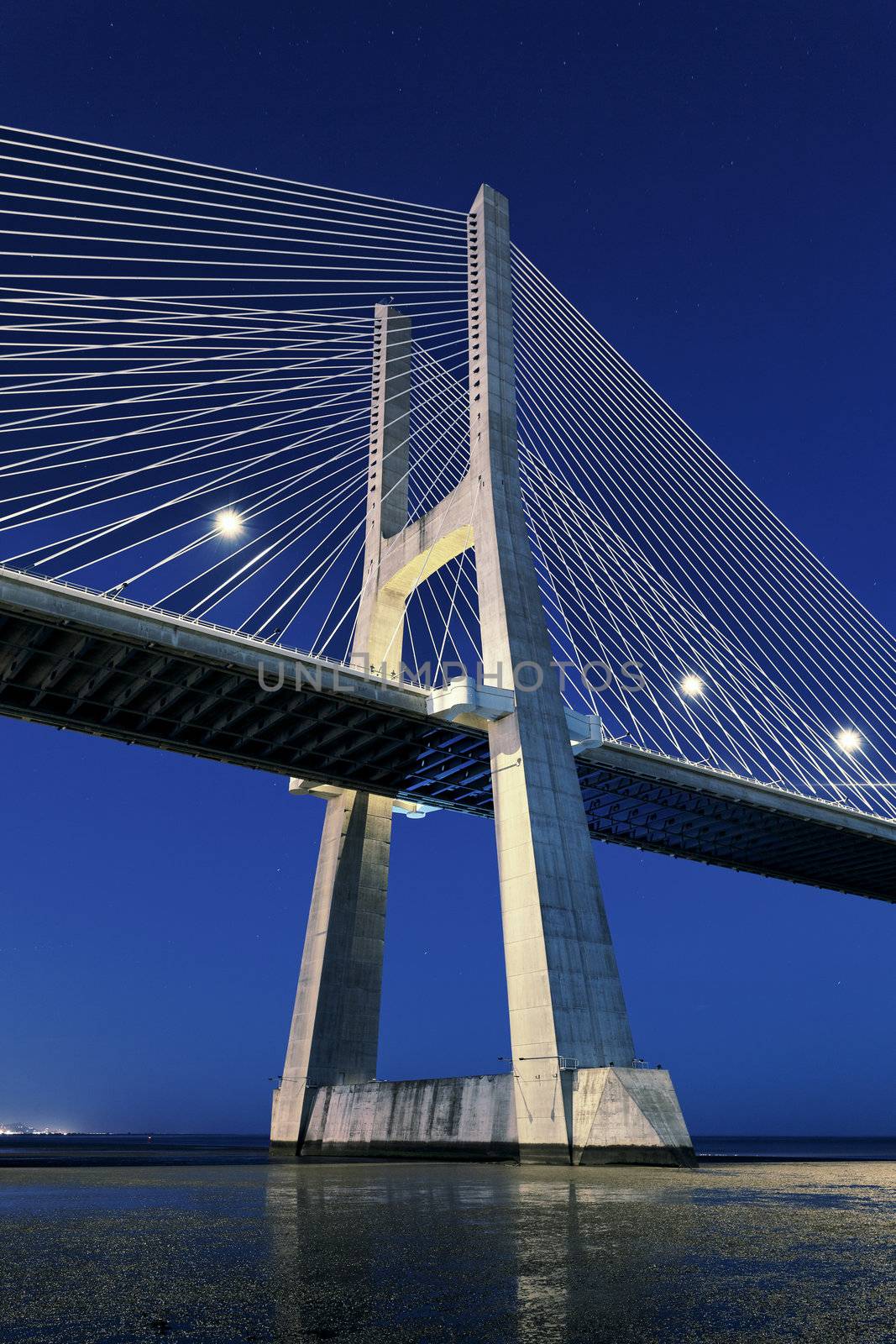 vertical view of Vasco da Gama bridge by night, Lisbon