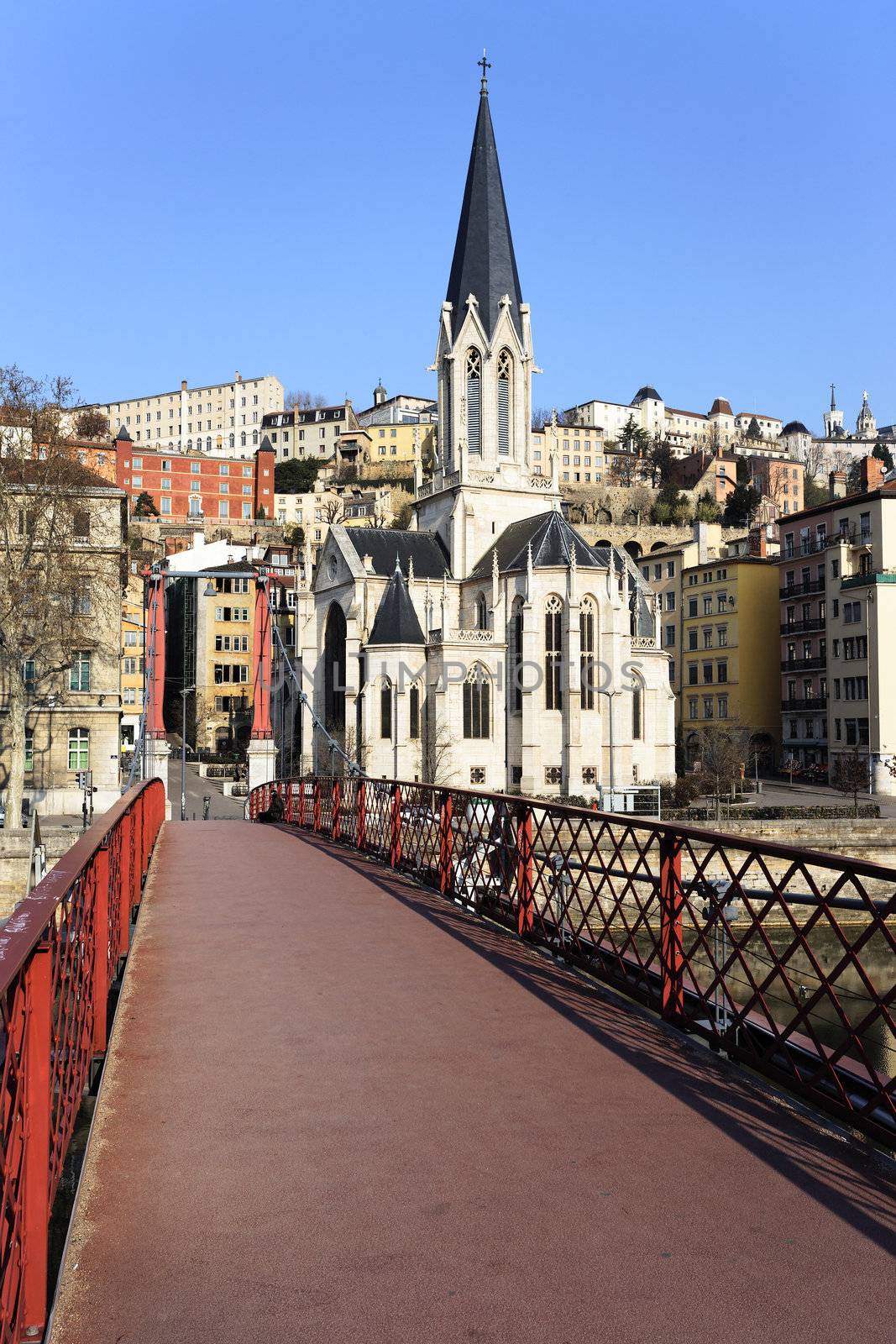 view of Lyon with red footbridge on Saone river