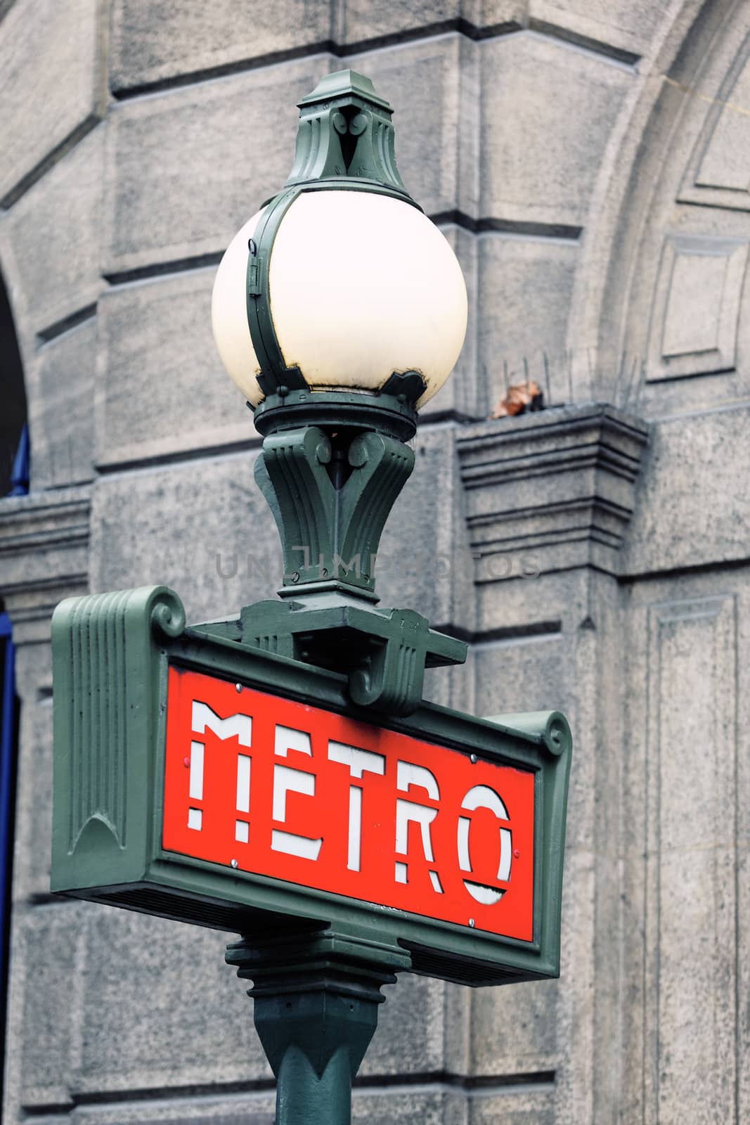 Red and green metro sign in Paris France 