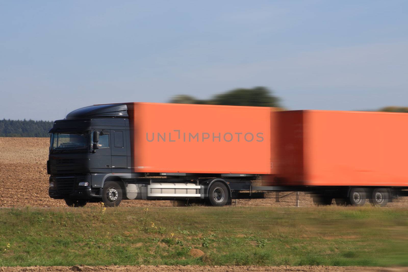 truck on asphalt road by photochecker