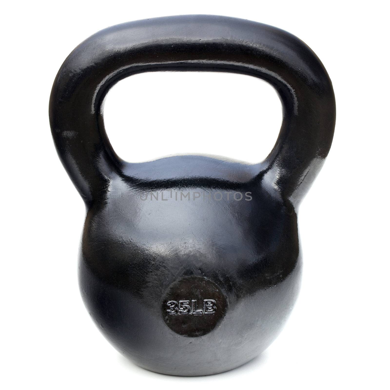 black shiny 35 lb iron kettlebell for weightlifting and fitness  training isolated on white