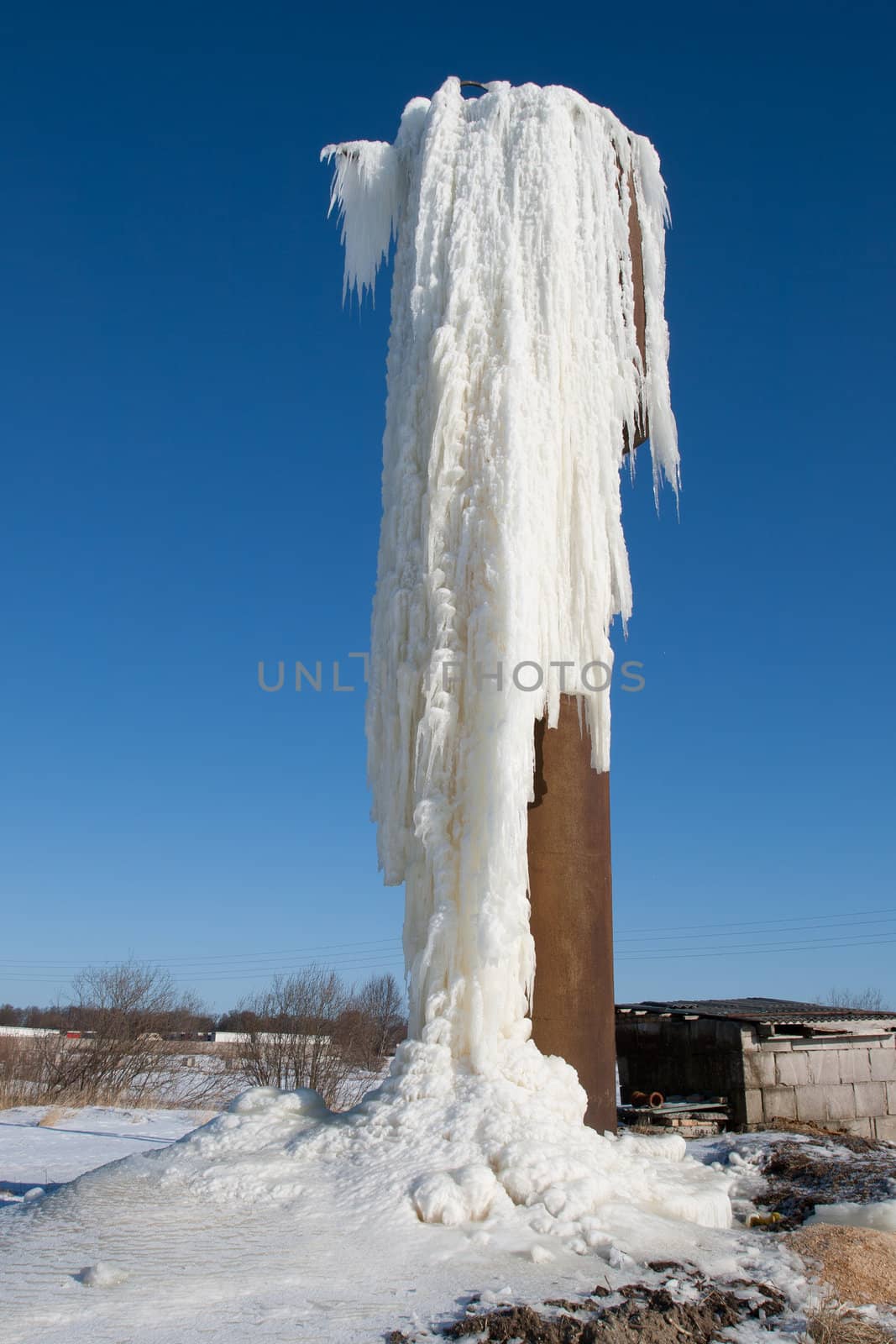 accident in an old rusted water tower,frozen water