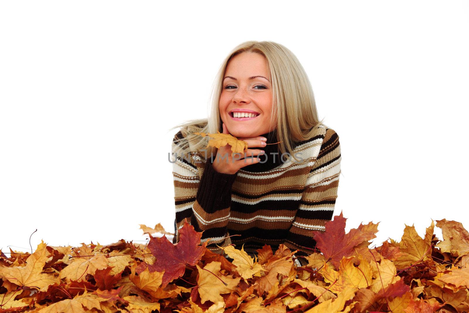  studio portrait of autumn woman in  yellow leaves