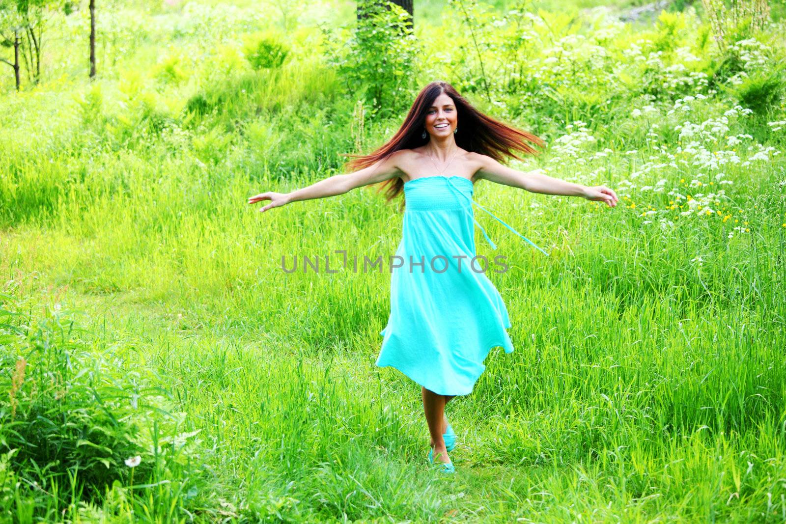 happy woman dance in forest