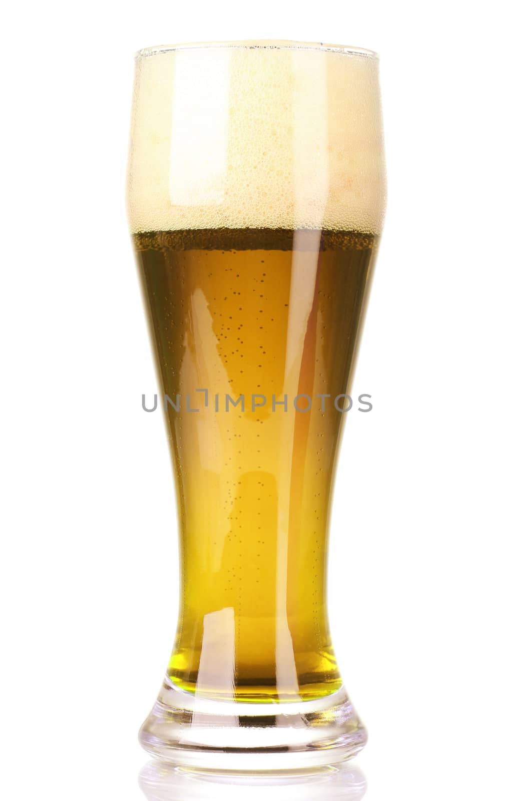 Frosty glass of light beer isolated on a white background