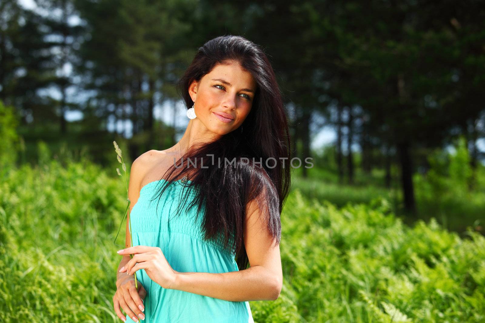 woman in grass close up