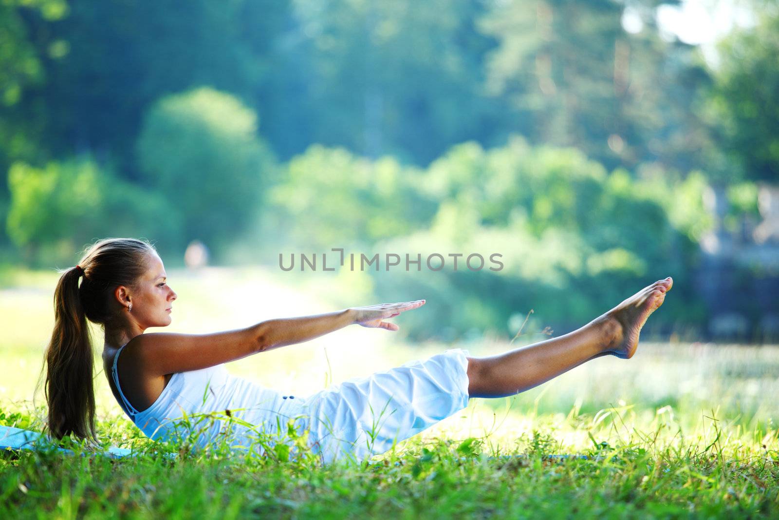  woman lay and training on ground 