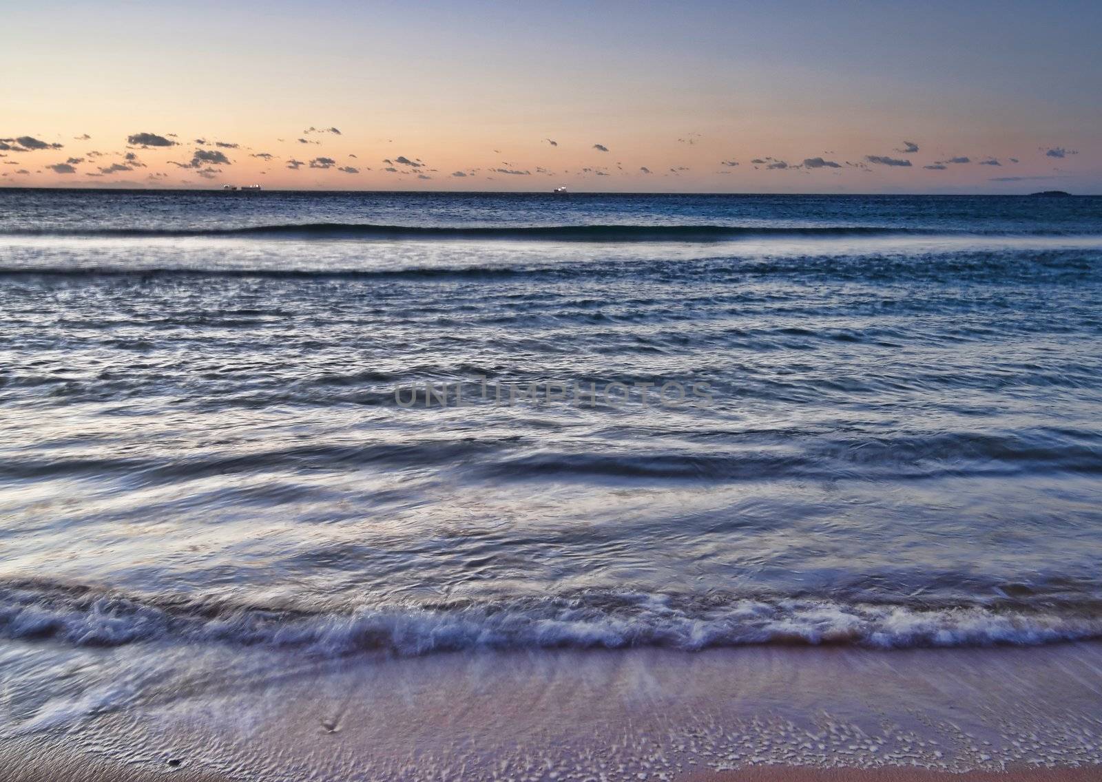 peaceful beach sunrise by clearviewstock