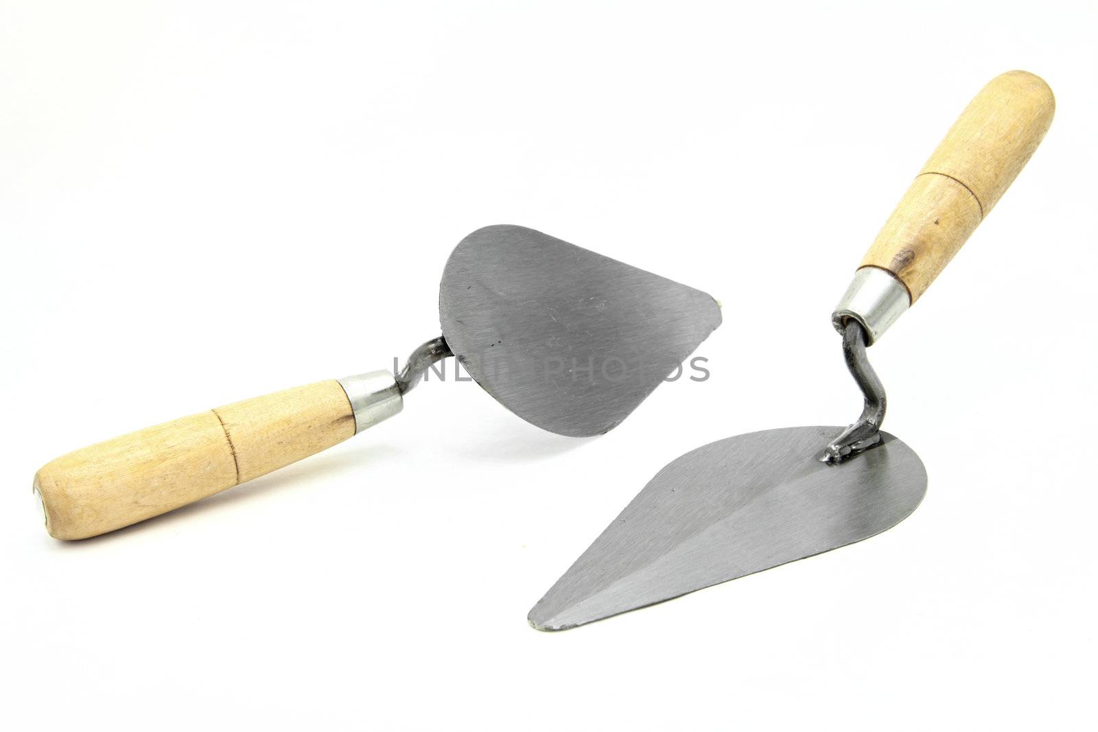 two construction trowel or lute isolated on white