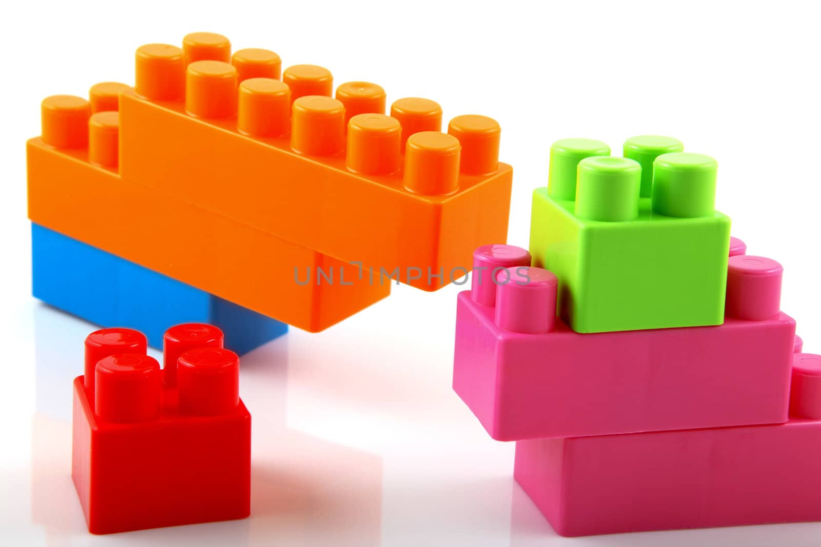 Plastic building blocks on a white background