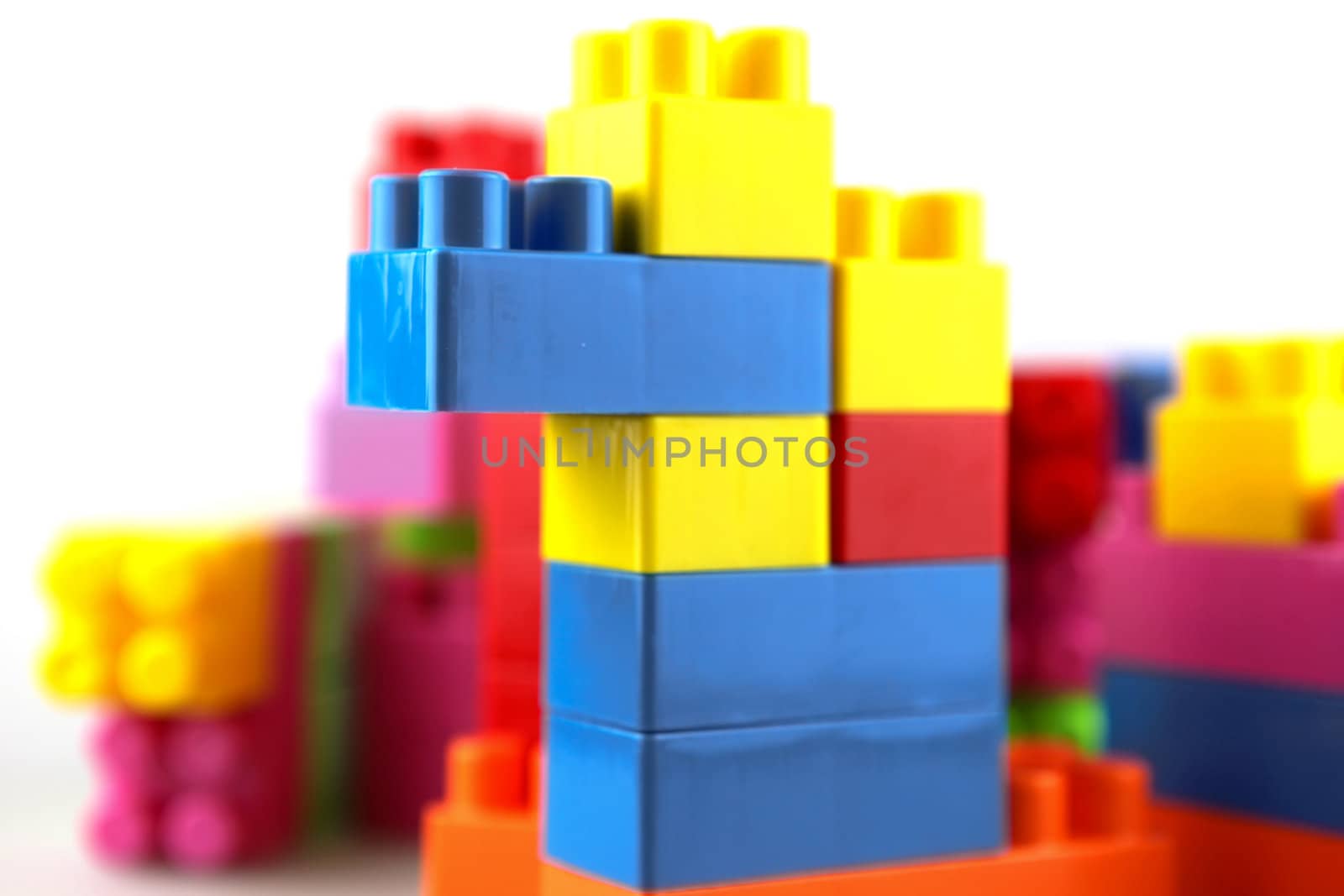 Plastic building blocks on a white background