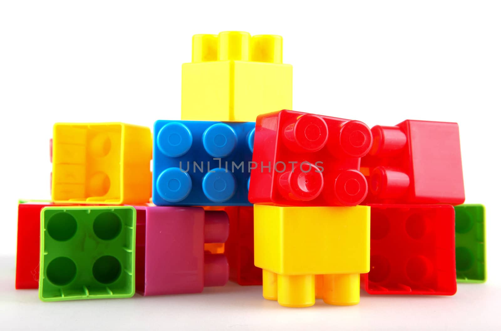 Plastic building blocks on a white background